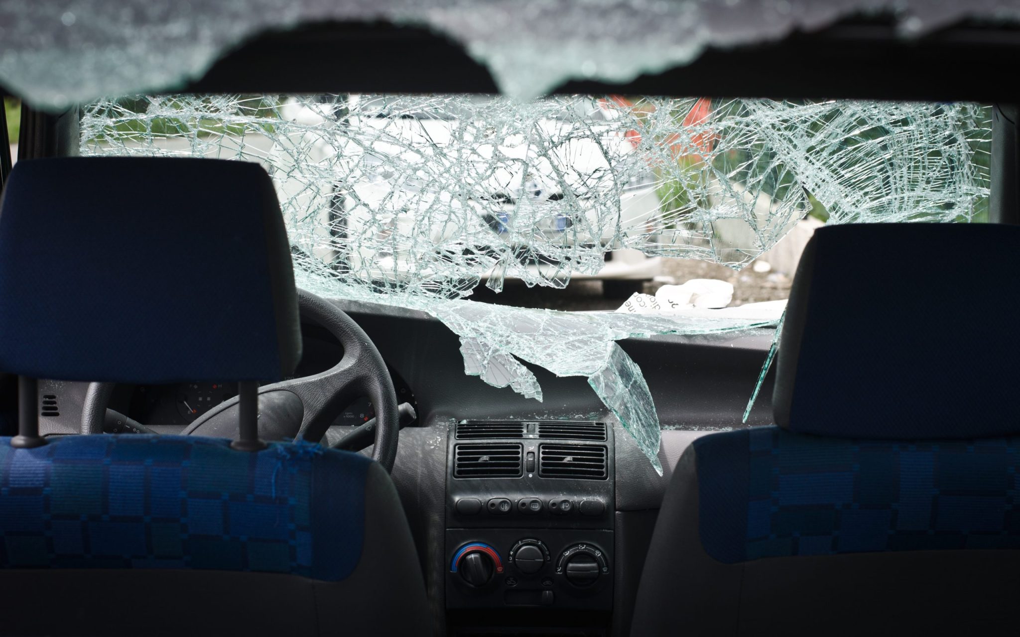 With the interior of the car displaying a cracked window following an accident, the need for a Freeport personal injury attorney arises to provide legal assistance and representation for potential claims resulting from the incident.